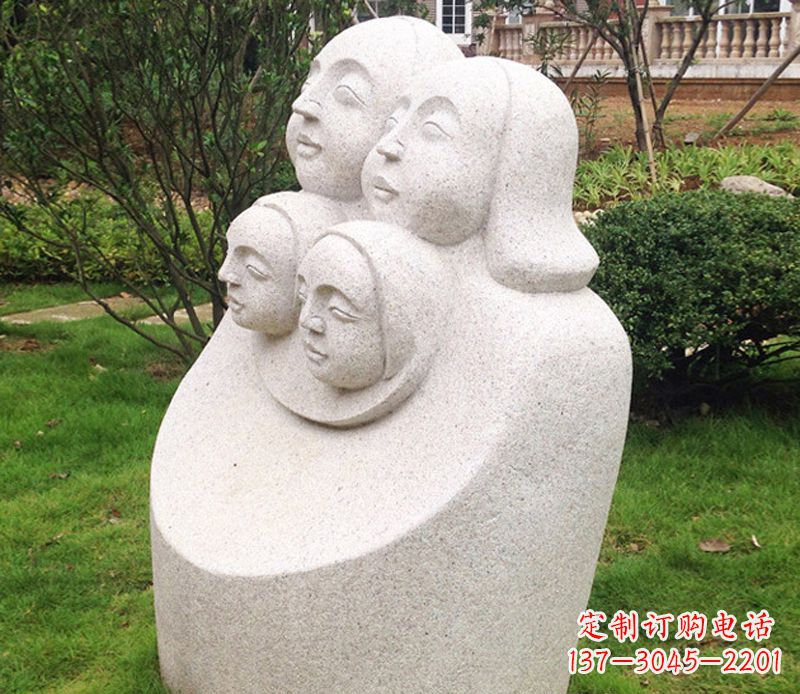 湖北公园母子人头像石雕