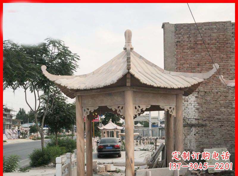 湖北公园晚霞红六角石凉亭雕塑