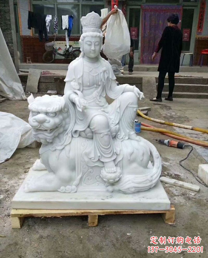 湖北汉白玉乘狮子的文殊菩萨