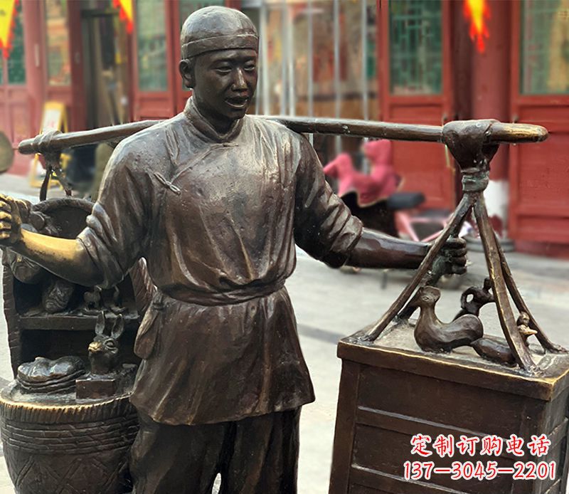 湖北铜雕步行街卖货郎人物雕塑