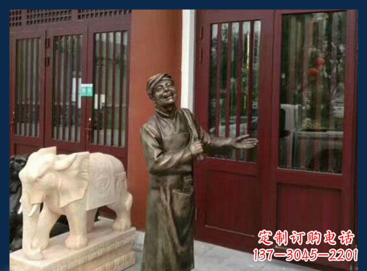 湖北铜雕店小二酒店迎宾人物雕塑