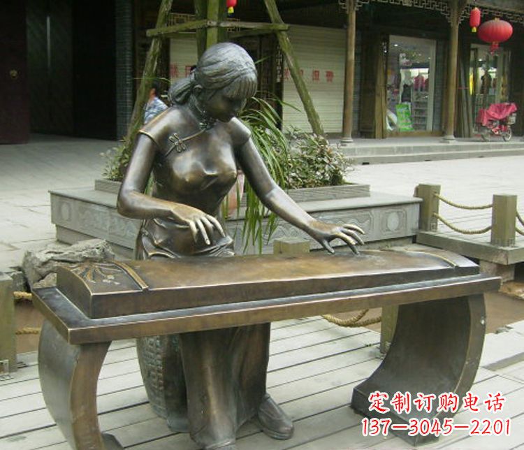 湖北铜雕现代人物弹古筝雕塑