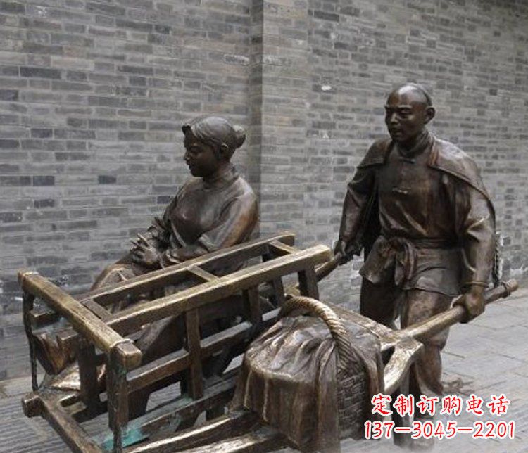 湖北推独轮车的人物铜雕