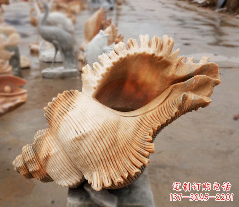 湖北晚霞红海螺石雕广场景观雕塑
