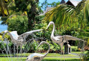 湖北鹤雕塑-公园池塘不锈钢镜面抽象喷泉中的鹤雕塑