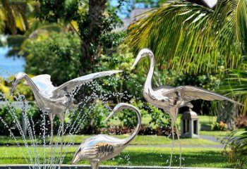 湖北仙鹤雕塑-公园池塘不锈钢喷泉中的仙鹤雕塑